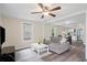 Comfortable living room open to kitchen, with hardwood floors and plenty of natural light at 1591 Jonesboro Se Rd, Atlanta, GA 30315