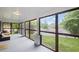Bright and airy screened porch with views of the surrounding neighborhood at 1591 Jonesboro Se Rd, Atlanta, GA 30315