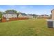 Large backyard with well-maintained lawn and wooden fence around the perimeter at 3825 Sycamore Hill Dr, Loganville, GA 30052