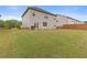 Spacious backyard featuring lush green grass and plenty of room for activities at 3825 Sycamore Hill Dr, Loganville, GA 30052