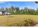 Beautiful common area with lush lawn, walkways, and benches at 3825 Sycamore Hill Dr, Loganville, GA 30052