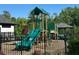 Community playground with slides and climbing structures for outdoor fun at 3825 Sycamore Hill Dr, Loganville, GA 30052