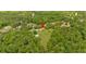 Bird's eye view of property reveals a home site surrounded by lush greenery and wooded areas at 7783 Cantrell Rd, Douglasville, GA 30135