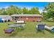 Lush backyard with mature trees offers plenty of space for outdoor activities at 7783 Cantrell Rd, Douglasville, GA 30135