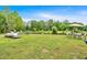 Wide backyard with mature trees offering ample space for outdoor activities at 7783 Cantrell Rd, Douglasville, GA 30135