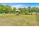 Sprawling backyard with a mix of lawn and natural landscaping, ideal for outdoor enjoyment at 7783 Cantrell Rd, Douglasville, GA 30135