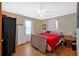 Comfortable bedroom with hardwood floors, closet, and ample natural light at 7783 Cantrell Rd, Douglasville, GA 30135