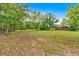 Expansive front yard with mature trees, offering privacy and a serene setting at 7783 Cantrell Rd, Douglasville, GA 30135