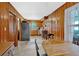 Traditional kitchen with wood paneling, stainless steel appliances, and functional layout at 7783 Cantrell Rd, Douglasville, GA 30135
