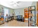 Versatile room with neutral paint, modern shelving, and space for desks or hobbies at 7783 Cantrell Rd, Douglasville, GA 30135