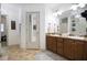 Bathroom featuring double vanity, a shower, and a chandelier at 13 Cottage Nw Walk, Cartersville, GA 30121