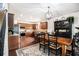 Warm dining area with hardwood floors adjacent to the open kitchen; perfect for Gathering meals at 13 Cottage Nw Walk, Cartersville, GA 30121
