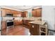 Well-equipped kitchen with stainless steel appliances, granite countertops, and hardwood floors at 13 Cottage Nw Walk, Cartersville, GA 30121