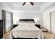 Comfortable main bedroom with ceiling fan, generous natural light, and neutral décor at 13 Cottage Nw Walk, Cartersville, GA 30121
