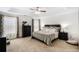 Spacious main bedroom features trey ceiling, large windows, and a soothing color palette at 13 Cottage Nw Walk, Cartersville, GA 30121