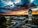 Clock tower overlooking downtown with a colorful sunset at 165 Craines Vw, Covington, GA 30014