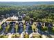 Community shot of homes with tree line in the background showing the proximity to nature at 165 Craines Vw, Covington, GA 30014