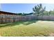 Expansive backyard with lush green grass and wood fence creating a private outdoor space at 165 Craines Vw, Covington, GA 30014