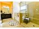 Bright bathroom featuring a glass shower, a soaking tub, and tile flooring at 165 Craines Vw, Covington, GA 30014