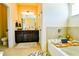 Bright bathroom featuring double vanity, soaking tub, and a walk-in shower at 165 Craines Vw, Covington, GA 30014