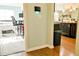 Open view into a bedroom and kitchen/living area creating a modern and welcoming layout at 165 Craines Vw, Covington, GA 30014