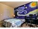 Bedroom with beautiful painted mural, large window and a desk at 165 Craines Vw, Covington, GA 30014