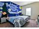 Bedroom with beautiful painted mural, large window and a desk at 165 Craines Vw, Covington, GA 30014