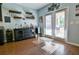 Dining area featuring a bar area with wine storage and a view of the back yard at 165 Craines Vw, Covington, GA 30014