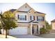 Beautiful two-story home with brick and siding, complemented by a well-kept lawn and two-car garage at 165 Craines Vw, Covington, GA 30014