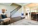 Bright foyer with staircase, hardwood floors, and an open concept layout at 165 Craines Vw, Covington, GA 30014