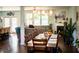 Open-concept living space showcasing a fireplace and a large, comfortable sectional at 165 Craines Vw, Covington, GA 30014