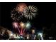 Fireworks display above a town at night at 165 Craines Vw, Covington, GA 30014