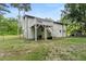 A serene backyard features a charming deck with staircase, ideal for outdoor enjoyment at 4170 Maroney Mill Rd, Douglasville, GA 30134