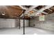 Unfinished basement with block walls and mechanicals in view at 4170 Maroney Mill Rd, Douglasville, GA 30134
