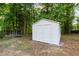 Exterior view of the storage shed nestled in the home's backyard at 4170 Maroney Mill Rd, Douglasville, GA 30134