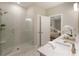 Bright, neutral bathroom features tiled shower, double sinks, and great natural light at 714 Chipping Sparrow St, Canton, GA 30115
