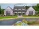 Stunning exterior of clubhouse with brick accents, manicured landscaping, and a welcoming entrance at 714 Chipping Sparrow St, Canton, GA 30115