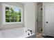 Relaxing tub with tile surround, and a glass-enclosed shower at 17 Hiram Way, Hiram, GA 30141