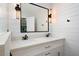 Stylish bathroom boasting a double sink vanity with modern fixtures and a large mirror, creating a functional space at 17 Hiram Way, Hiram, GA 30141
