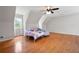 A large bedroom features hardwood floors and sloped ceilings at 17 Hiram Way, Hiram, GA 30141