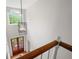 Entryway features hardwood floors, modern lighting, and wood railing at 17 Hiram Way, Hiram, GA 30141