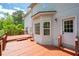 Exterior featuring a home, wooden deck, windows, and a white door at 17 Hiram Way, Hiram, GA 30141