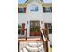 Stately front entrance showcases double doors, brick steps, a wooden deck, and exterior lighting fixtures at 17 Hiram Way, Hiram, GA 30141