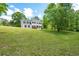Traditional home with a sprawling front lawn and established shade trees at 17 Hiram Way, Hiram, GA 30141