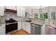 Modern kitchen features stainless steel appliances and granite countertops at 17 Hiram Way, Hiram, GA 30141