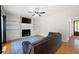 Living room with a fireplace, built-in shelving, hardwood flooring, and a blue area rug at 17 Hiram Way, Hiram, GA 30141