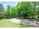 Wooded property with mature trees at 17 Hiram Way, Hiram, GA 30141