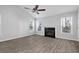 Spacious living room featuring a fireplace and large windows offering abundant natural light at 194 Beaverwood Ct, Lawrenceville, GA 30044
