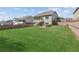 Expansive backyard with lush green grass and privacy fencing, ideal for outdoor activities at 2470 Crimson Downs Dr, Cumming, GA 30040