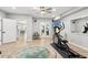 Versatile basement space perfect for a home gym, complete with modern exercise equipment and stylish decor at 2470 Crimson Downs Dr, Cumming, GA 30040